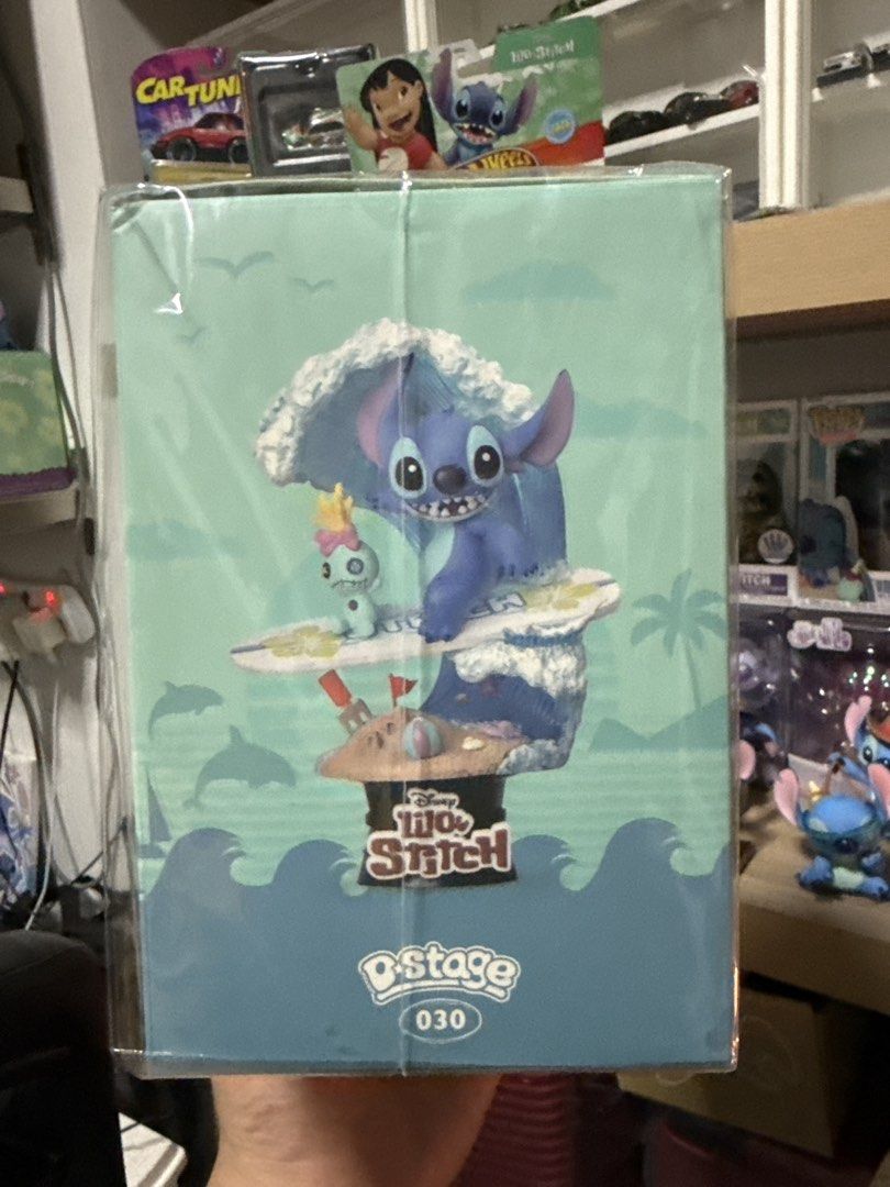 Disney Stitch Surf D-Stage 030 Beast Kingdom Figure (Category: Toy Figures) located in Singapore. Submitted by koks96 (Listing ID 1442119268, Image 2). Description: - Beast Kingdom D-Stage 030 Stitch Surf figure - Approximately 6 inches tall - Highly detailed exterior with professional paintwork - Includes official logo tag - Ideal collectible for any Stitch enthusiast.