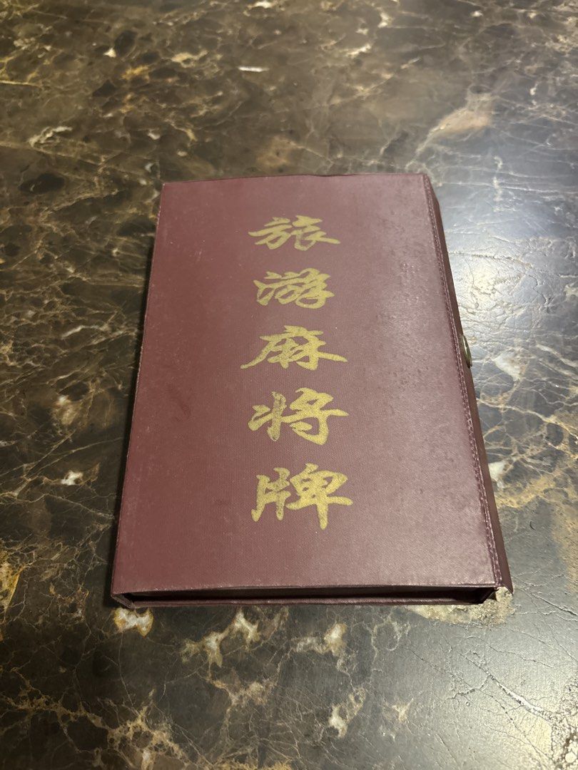 (Brand New and Sealed) Vintage mini Chinese Mahjong Set with Case (Category: Board Games & Puzzles) located in Singapore. Submitted by anna20_crystal (Listing ID 1447031703, Image 3). Description: - Complete mini Mahjong tiles -17mm x 11.5mm x2mm - Includes all tiles and dice - Deep red case with gold Chinese characters - Standard size and design tiles - Perfect for game nights.