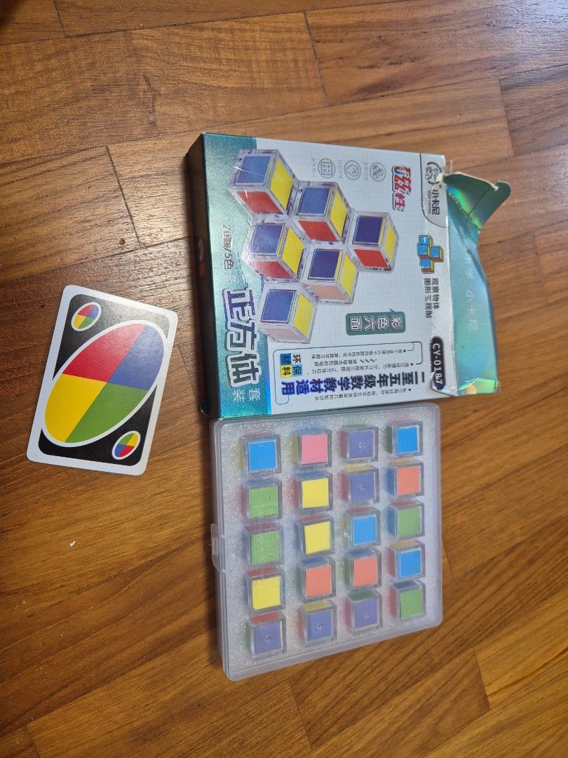 Educational Math Cubes for Learning Geometry (Category: Educational & Learning Toys) located in Singapore. Submitted by notogst (Listing ID 1448926316, Image 1). Description: - Set of colorful math cubes for learning. - Helps understand shapes and volume. - Brightly colored and easy to handle. - Comes with a box and storage case. - Magnetic.