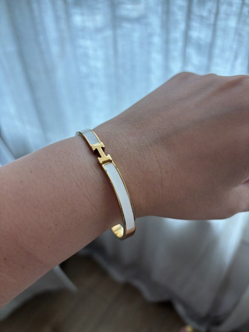 Designer Inspired Bracelets - Gold Tone (Category: Bracelets) located in Singapore. Submitted by rin_rin (Listing ID 1449163537, Image 7). Description: Selling my stash of gold bangles. Only worn for photo taking for this listing, never worn out. Kept well. - Inspired pieces, good quality - Price is fixed for 1, buy more for lower price - Chat more for details .