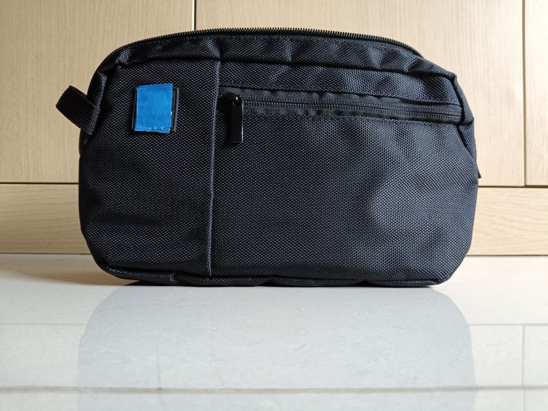 WTS: BN BLACK POUCH (Category: Everything Else) located in Singapore. Submitted by kf4791 (Listing ID 1449329116, Image 1). Description: Dear all Brand new pouch. Details as: - Durable & water resistant - Many compartment - Front zip pocket - Interior mesh pocket - Side handle for easy carrying - Ideal for travel or everyday use Dimensions are 29cm (L) X 17cm (H) X 8cm (D) Self collect at Pasir Ris Grove Additional $3 for postage Company name at 