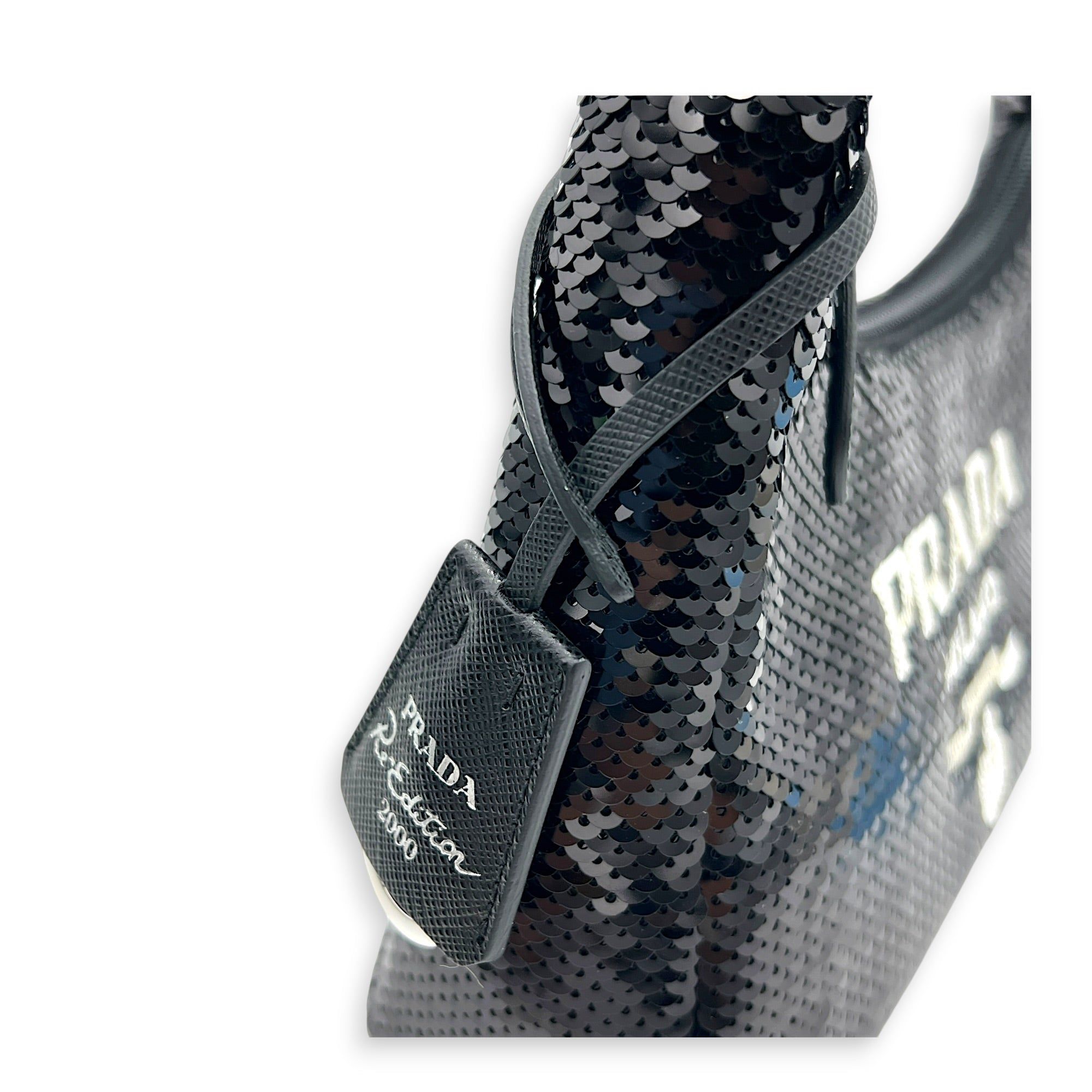 Prada Re-Edition 2000 Shoulder Bag Black in Sequins, Silver hardware (Category: Bags & Wallets) located in Singapore. Submitted by carousellluxury (Listing ID 1449628503, Image 8). Description: SKU S2605-011720AN Material Sequins Color Black Hardware Silver Strap Not Included Dimension (L)23cm x (H)14cm x (W)6cm Accessories Original Box, Series 270 Circa Est NA Microchipped FALSE Condition - Surface: very good condition overall - Surface: very go