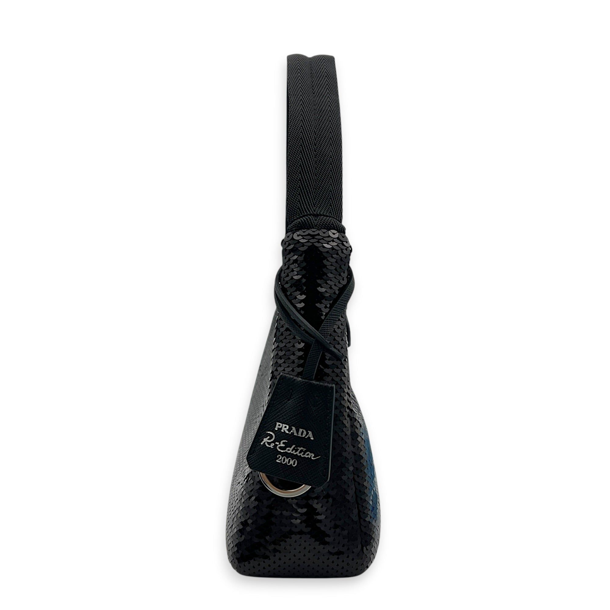 Prada Re-Edition 2000 Shoulder Bag Black in Sequins, Silver hardware (Category: Bags & Wallets) located in Singapore. Submitted by carousellluxury (Listing ID 1449628503, Image 4). Description: SKU S2605-011720AN Material Sequins Color Black Hardware Silver Strap Not Included Dimension (L)23cm x (H)14cm x (W)6cm Accessories Original Box, Series 270 Circa Est NA Microchipped FALSE Condition - Surface: very good condition overall - Surface: very go