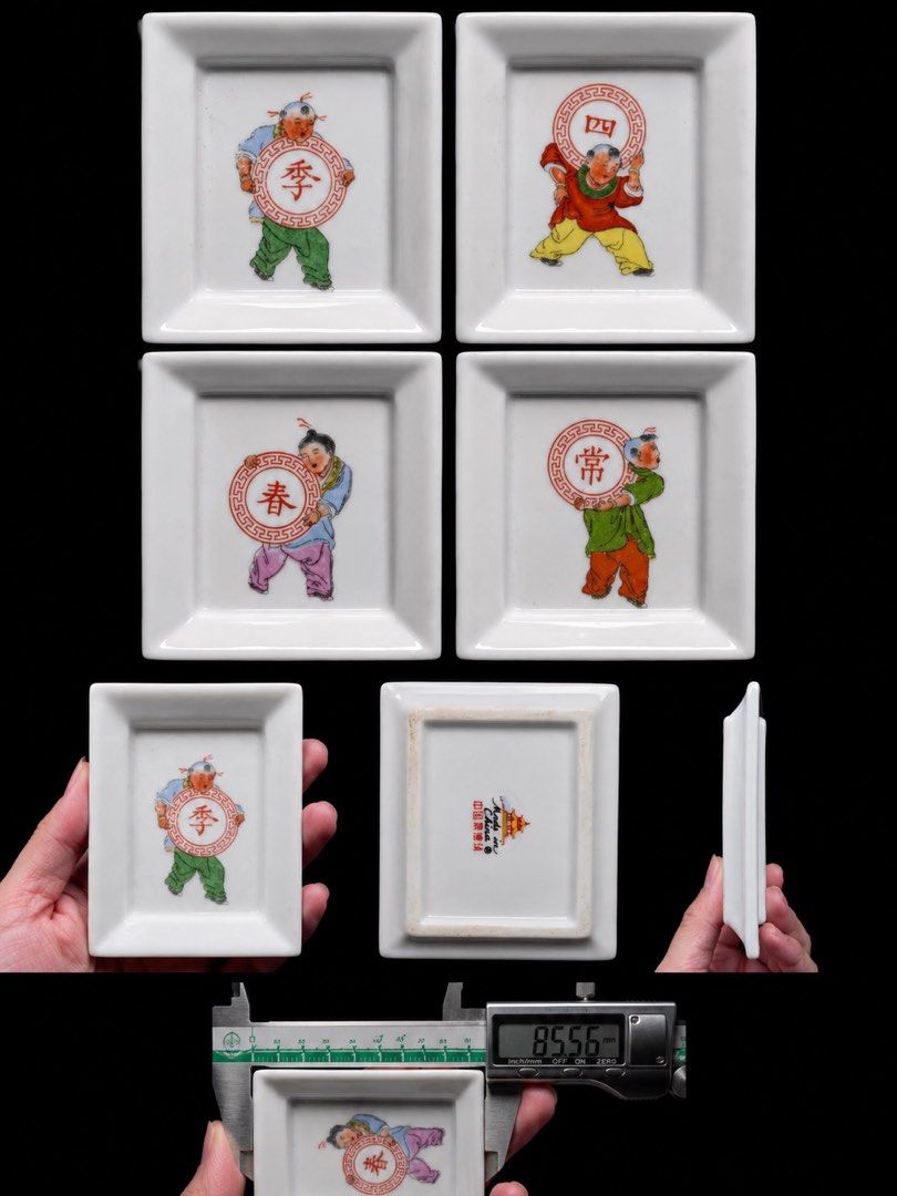 Set of 4 Chinese Porcelain Dishes with Figures Kung fu (Category: Art & Prints) located in Singapore. Submitted by achinesehut (Listing ID 1450020309, Image 2). Description: - Set of 4 small porcelain dishes - Unique illustrations of people holding circular emblems with Chinese characters - Vibrant colors and fine details - Rectangular shape with slightly raised edges - Ideal for serving small snacks or as decorative pieces - Dimensions: Approxim