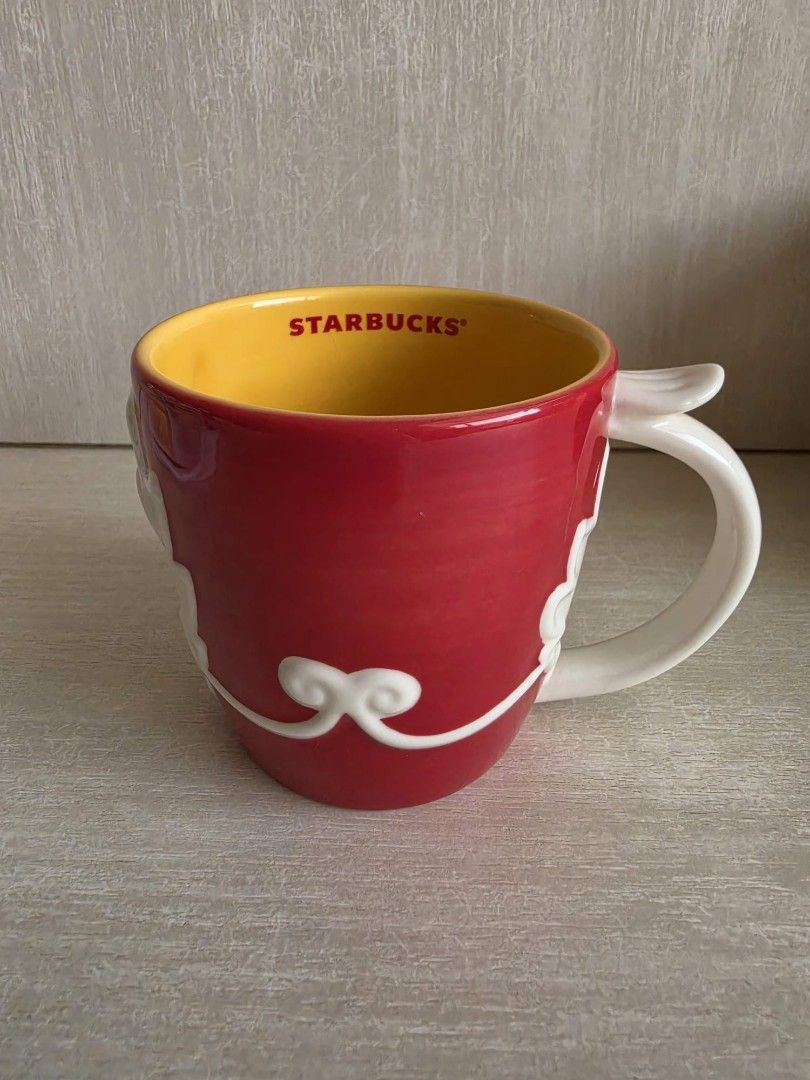 Starbucks Red Dragon Mug with Box (Category: Coffee & Tea Tableware) located in Singapore. Submitted by vl2768 (Listing ID 1449977010, Image 5). Description: - Red Starbucks mug - Features a white dragon design - Chinese character '龍' (dragon) on the handle - Comes with original Starbucks box - Ideal for collectors or dragon enthusiasts - Unique and eye-catching design.