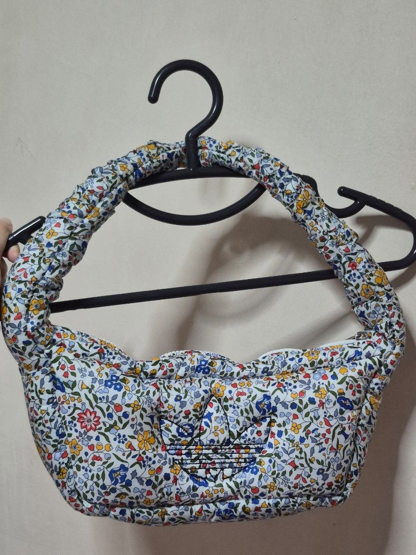 Adidas Originals x Liberty London Small Shoulder Bag Floral (Category: Cross-body Bags) located in Singapore. Submitted by domopi (Listing ID 1450279601, Image 1). Description: - Only used for once or twice - Collaboration between Adidas Originals and Liberty London - Padded and comfortable strap - Can fit a phone and essentials.