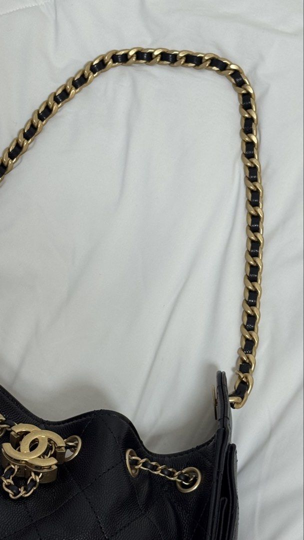Chanel 25 Mini Hobo Bag in Black Caviar and AGHW (Category: Bags & Wallets) located in Singapore. Submitted by shopflux (Listing ID 1448419272, Image 5). Description: In Caviar and aged gold hardware (highly sought combo) Full Set - Mar 2026 Bought from Japan boutique Microchipped Used twice lightly only Condition: 10/10 like new condition Can fit a lot stuff even though it’s mini size and suits many occasions, classic piece! Comes with: Full set