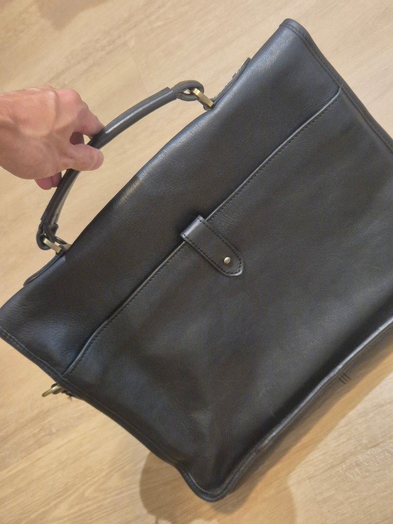 Genuine Mulberry Men's Black Leather Briefcase Messenger Bag, V Good Condition! (Not Coach) (Category: Briefcases) located in Singapore. Submitted by gleeli (Listing ID 1450189968, Image 2). Description: - RARE 2015 authentic Mulberry black leather briefcase. Leather has been oiled and stored well for last 10yrs! - Iconic Mulberry tree logo (interior & exterior), embossed on front leather (see photos) - Elegant brass hardware, with magnetic butto