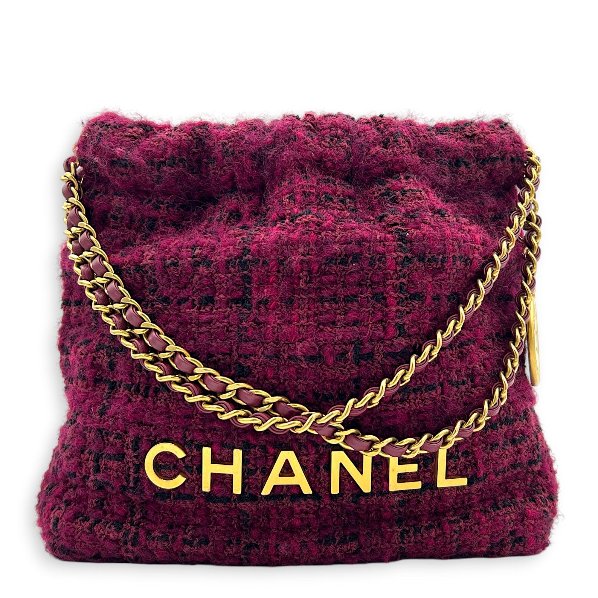 Chanel 22 Tote Shoulder Bag Purple in Tweed, Gold hardware (Category: Bags & Wallets) located in Singapore. Submitted by carousellluxury (Listing ID 1451417754, Image 1). Description: SKU S2606-012427AN Material Tweed Color Purple Hardware Gold Strap Included, non-detachable and adjustable Dimension (L)20cm x (H)18cm x (W)5cm Accessories Dust Bag, Series RFID Circa Est NA Microchipped TRUE Condition - Surface: Very good condition - Bottom Edge / 
