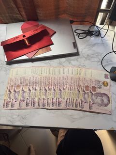buying portrait sgd $1000 notes
