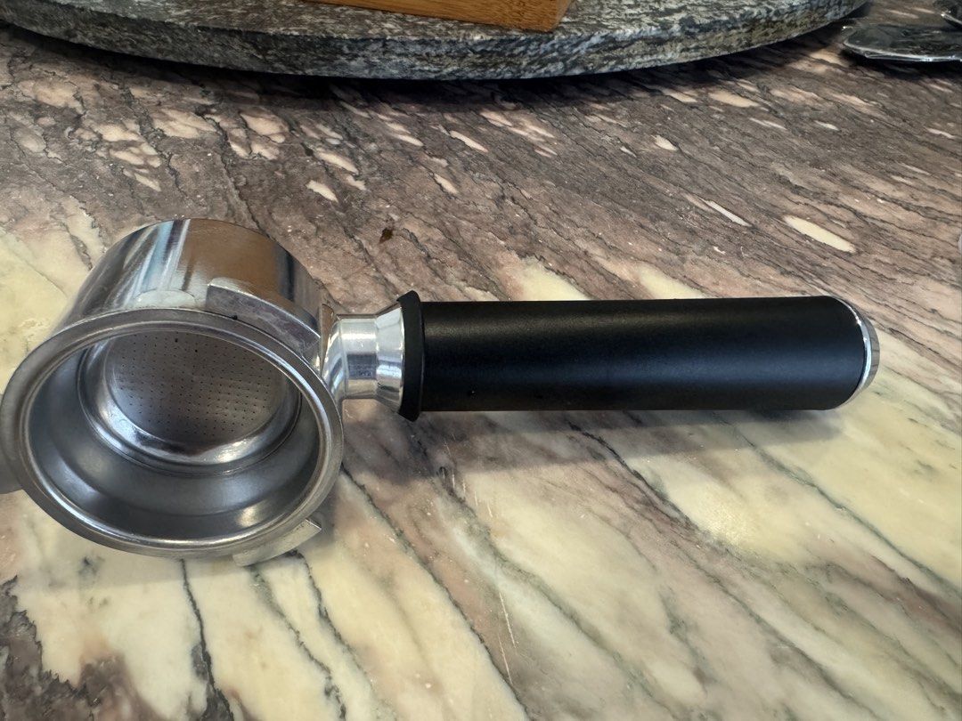 De Longhi Espresso Coffee Machine Filter Basket - Stainless Steel (Category: Bathroom & Kitchen Fixtures) located in Singapore. Submitted by croka (Listing ID 1451792537, Image 9). Description: - Stainless steel portafilter filter basket - Fits De Longhi espresso machines - Ideal for home baristas needing a replacement or spare - Note that cost is for one filter - Last two photos show the handle which these filters will fit. This is supplied with