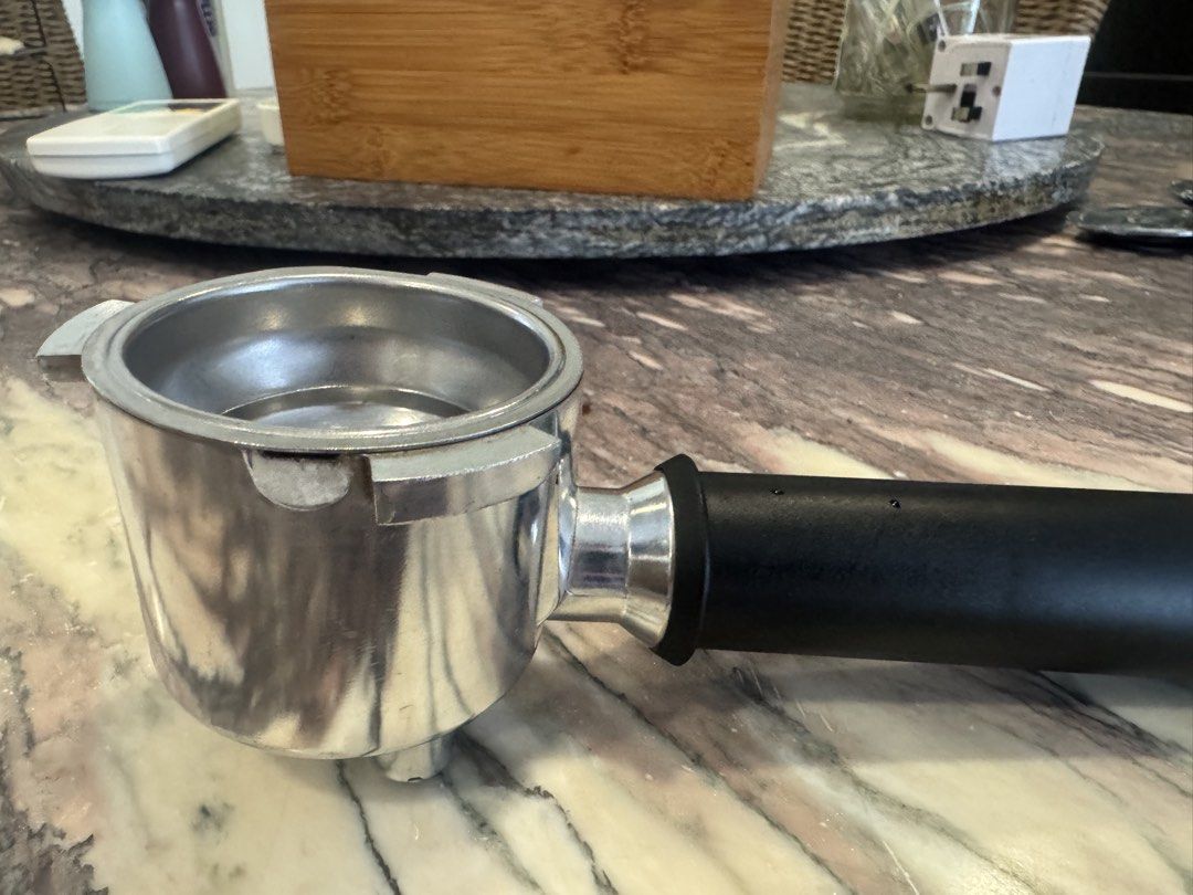 De Longhi Espresso Coffee Machine Filter Basket - Stainless Steel (Category: Bathroom & Kitchen Fixtures) located in Singapore. Submitted by croka (Listing ID 1451792537, Image 10). Description: - Stainless steel portafilter filter basket - Fits De Longhi espresso machines - Ideal for home baristas needing a replacement or spare - Note that cost is for one filter - Last two photos show the handle which these filters will fit. This is supplied wit