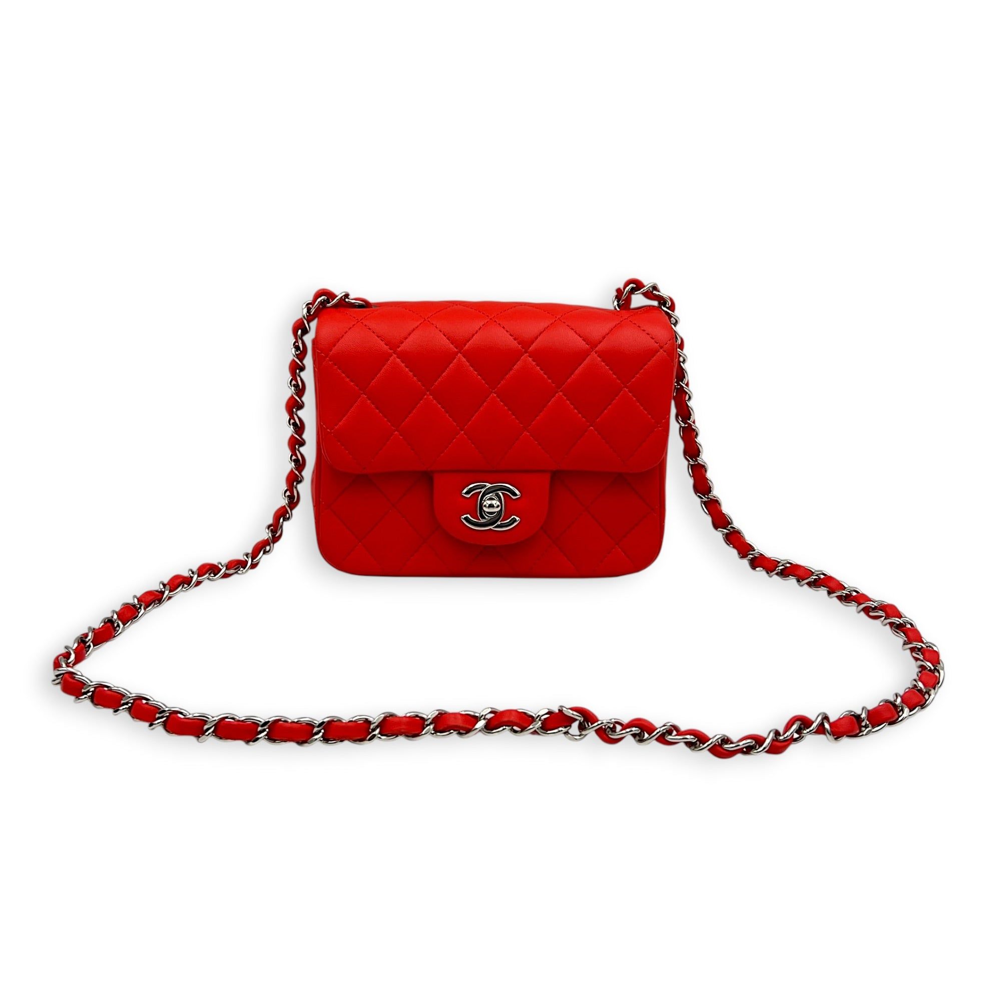Chanel Square Mini Red Shoulder Bag in Lambskin, Silver hardware (Category: Bags & Wallets) located in Singapore. Submitted by carousellluxury (Listing ID 1452156532, Image 7). Description: SKU C2607-013632AC Material Lambskin Size Mini Color Red Hardware Silver Strap Included, non-detachable and adjustable Dimension (L)17cm x (H)13cm x (W)8cm Accessories Original Box, Dust Bag, Authentication Card, Series 27268206 Circa Est 2019 Microchipped FAL