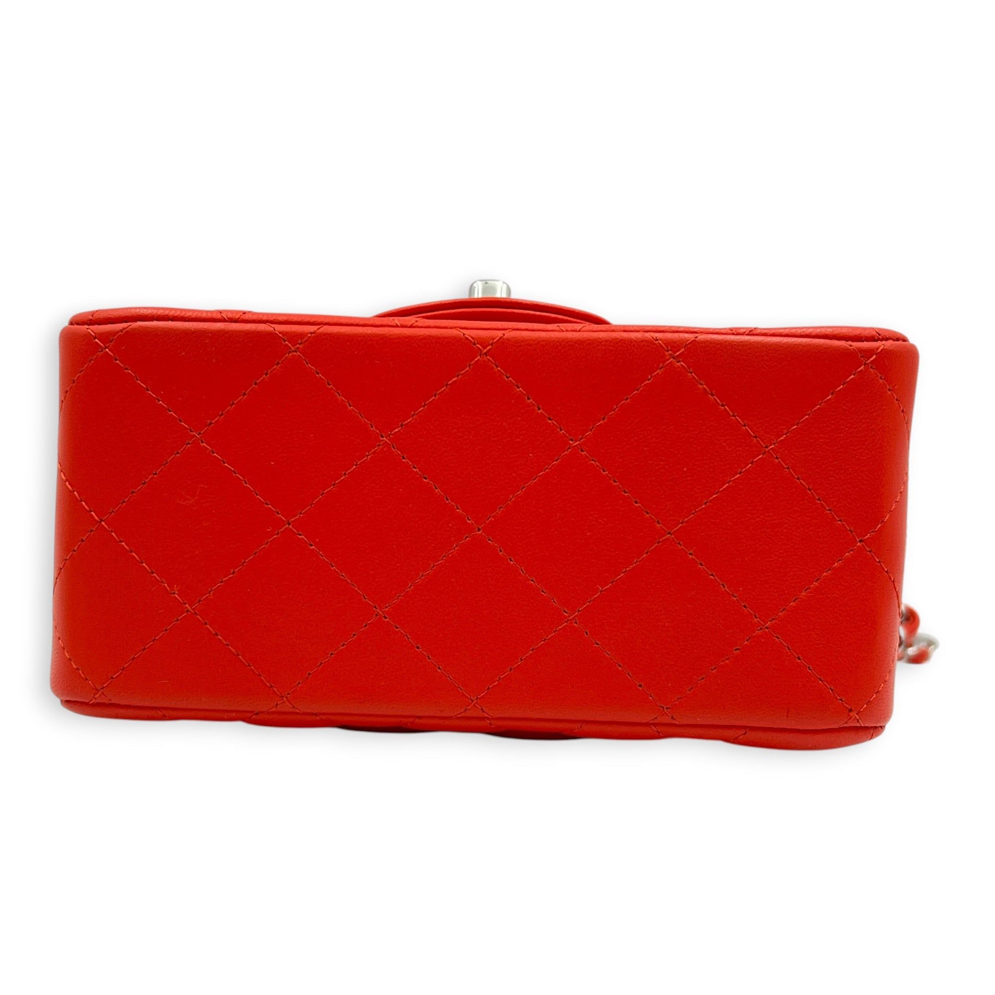 Chanel Square Mini Red Shoulder Bag in Lambskin, Silver hardware (Category: Bags & Wallets) located in Singapore. Submitted by carousellluxury (Listing ID 1452156532, Image 5). Description: SKU C2607-013632AC Material Lambskin Size Mini Color Red Hardware Silver Strap Included, non-detachable and adjustable Dimension (L)17cm x (H)13cm x (W)8cm Accessories Original Box, Dust Bag, Authentication Card, Series 27268206 Circa Est 2019 Microchipped FAL