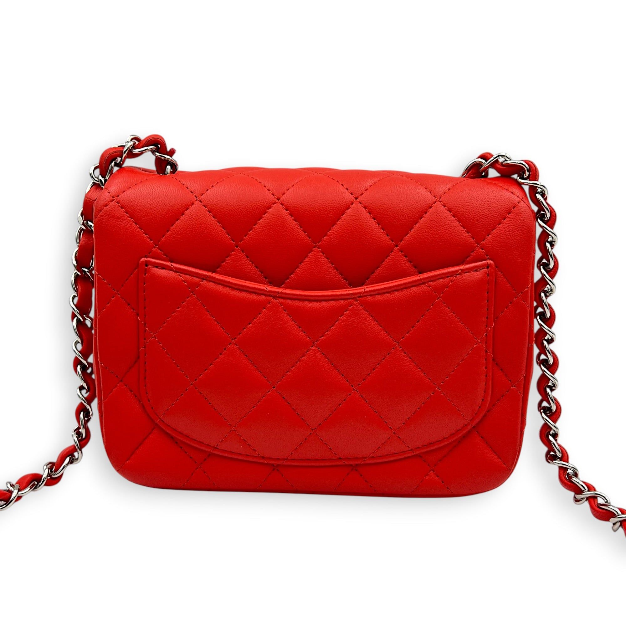 Chanel Square Mini Red Shoulder Bag in Lambskin, Silver hardware (Category: Bags & Wallets) located in Singapore. Submitted by carousellluxury (Listing ID 1452156532, Image 2). Description: SKU C2607-013632AC Material Lambskin Size Mini Color Red Hardware Silver Strap Included, non-detachable and adjustable Dimension (L)17cm x (H)13cm x (W)8cm Accessories Original Box, Dust Bag, Authentication Card, Series 27268206 Circa Est 2019 Microchipped FAL