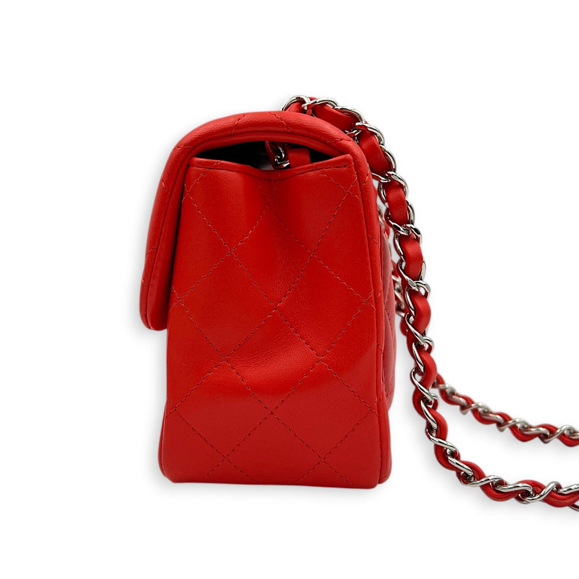 Chanel Square Mini Red Shoulder Bag in Lambskin, Silver hardware (Category: Bags & Wallets) located in Singapore. Submitted by carousellluxury (Listing ID 1452156532, Image 4). Description: SKU C2607-013632AC Material Lambskin Size Mini Color Red Hardware Silver Strap Included, non-detachable and adjustable Dimension (L)17cm x (H)13cm x (W)8cm Accessories Original Box, Dust Bag, Authentication Card, Series 27268206 Circa Est 2019 Microchipped FAL