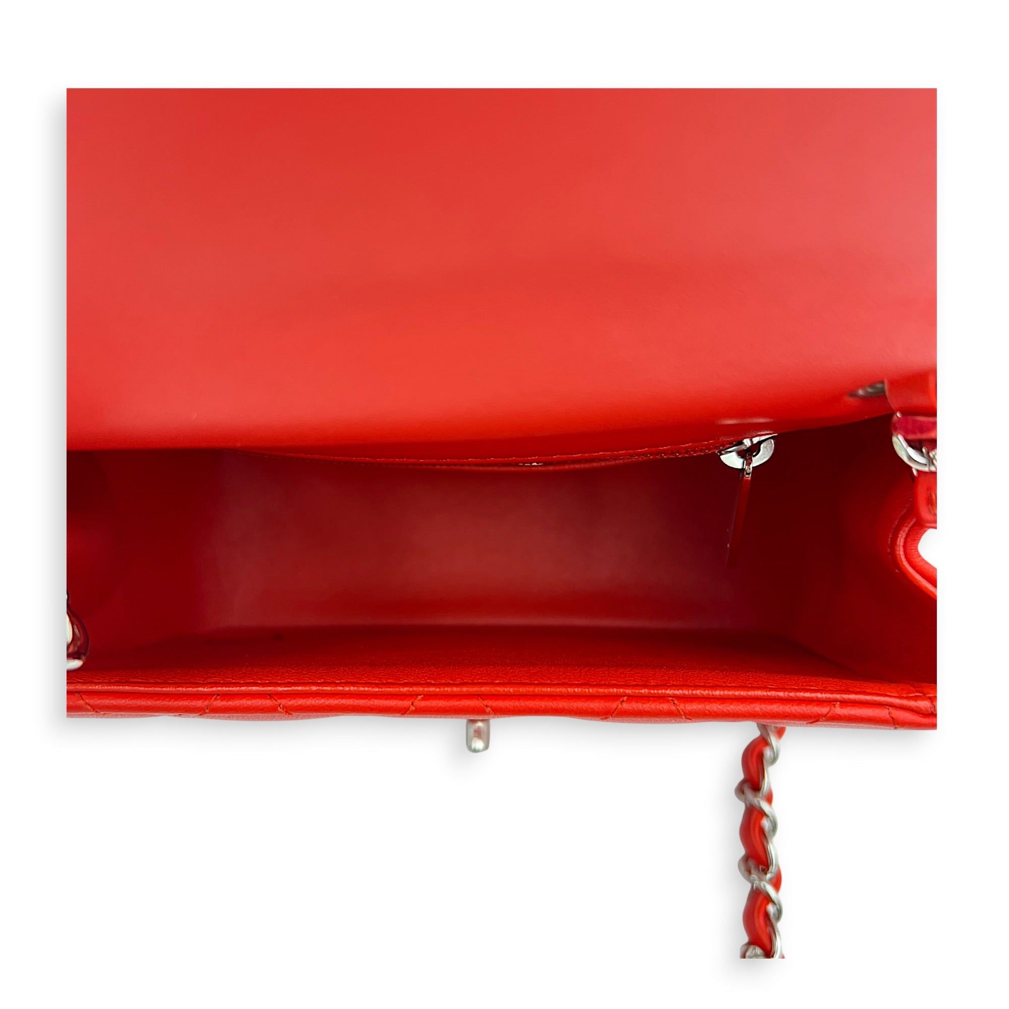 Chanel Square Mini Red Shoulder Bag in Lambskin, Silver hardware (Category: Bags & Wallets) located in Singapore. Submitted by carousellluxury (Listing ID 1452156532, Image 6). Description: SKU C2607-013632AC Material Lambskin Size Mini Color Red Hardware Silver Strap Included, non-detachable and adjustable Dimension (L)17cm x (H)13cm x (W)8cm Accessories Original Box, Dust Bag, Authentication Card, Series 27268206 Circa Est 2019 Microchipped FAL