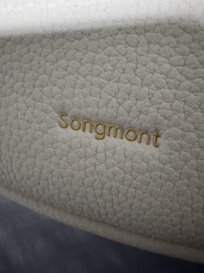 Songmont Luna Bag Cream Pebble Leather (Category: Shoulder Bags) located in Singapore. Submitted by jenray (Listing ID 1452475391, Image 4). Description: - Cream colored Songmont Luna bag - Pebble leather texture - Gold hardware details - Includes dust bag, box, shoulder strap and receipt - can be carried on shoulder and cross body. Can also be handheld - if you know bags, you would know this one - bought from Shanghai boutique .