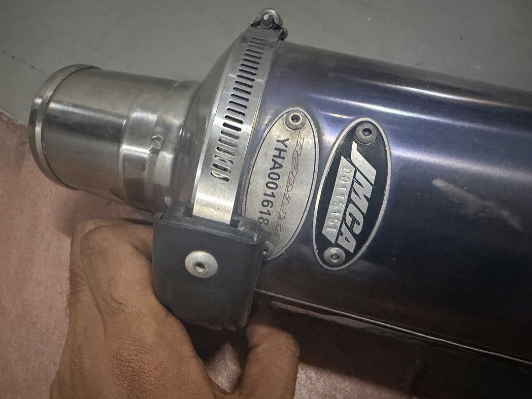 Cb400 spec 3 yoshimura exhaust (Category: Motorcycle Accessories) located in Singapore. Submitted by haresh7_ (Listing ID 1447456755, Image 2). Description: - Yoshimura Cyclone exhaust set (muffler and headers) - Made in Japan - Part number YHA001618 visible - Muffler features a blue tint - Sold as a complete set $300 for exhaust $100 for header Installation with labour fee.