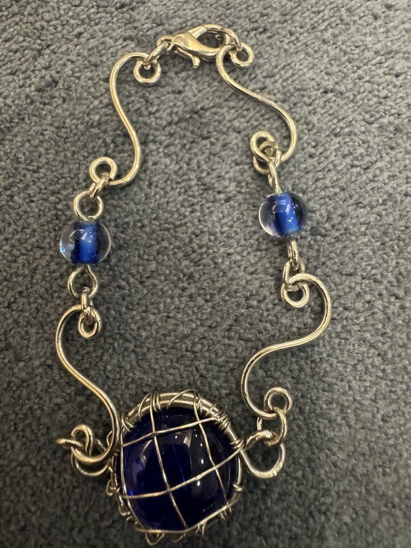 Silver Bracelet with blue glass stones (Category: Bracelets) located in Singapore. Submitted by croka (Listing ID 1452986625, Image 1). Description: Silver Bracelet with blue glass stones. Pick up from Katong 437831 or select delivery. .