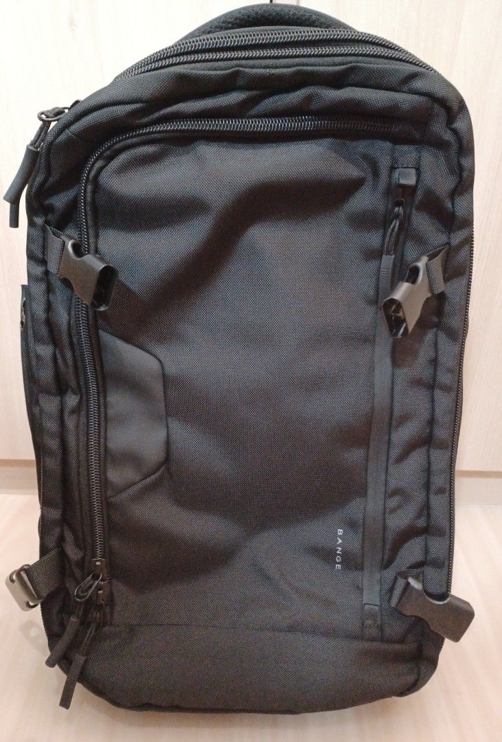 Black Travel Backpack (Category: Backpacks) located in Singapore. Submitted by j_heaven (Listing ID 1447985976, Image 1). Description: - Black backpack - Opens fully like a suitcase - Padded straps for comfort - Multiple pockets (inside & out) - Ideal for travel or everyday use - Sturdy zippers.