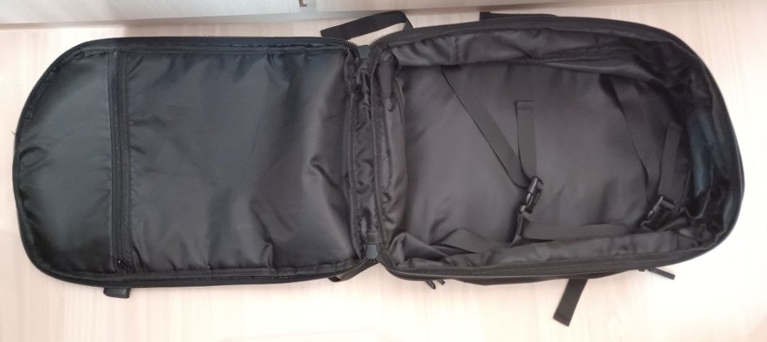 Black Travel Backpack (Category: Backpacks) located in Singapore. Submitted by j_heaven (Listing ID 1447985976, Image 3). Description: - Black backpack - Opens fully like a suitcase - Padded straps for comfort - Multiple pockets (inside & out) - Ideal for travel or everyday use - Sturdy zippers.