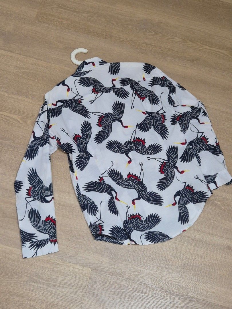Rare JAPAN Crane Print, Batik, button-up white long-sleeve shirt, Men (Category: Shirts) located in Singapore. Submitted by gleeli (Listing ID 1448420219, Image 2). Description: - Rare Made In Japan, White button-up shirt, Batik - Size S or M, Slim Fit, thin light material - Beautiful dark blue repeated crane print with red and yellow accents - Bought in Japan for SG$80++ (yr 2022) - Very good condition, hardly worn - Item is packed and ready to 