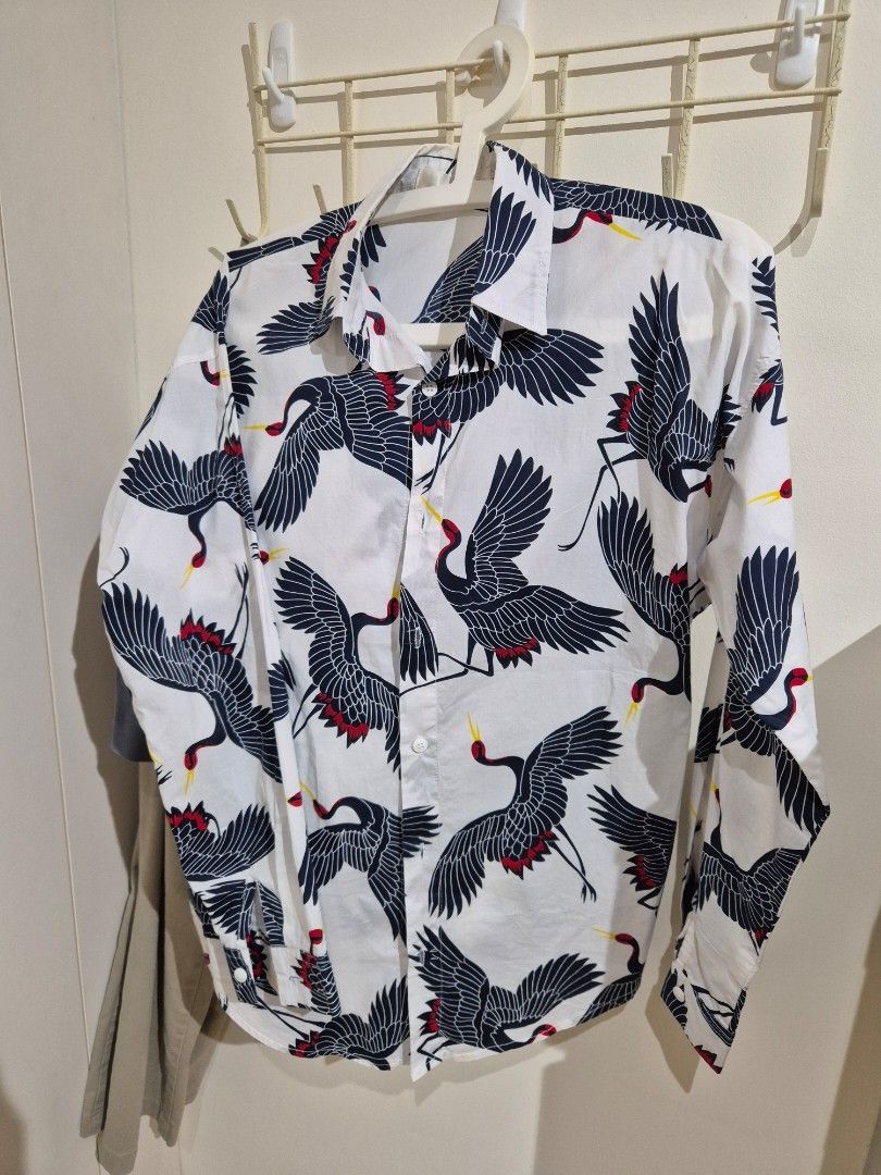 Rare JAPAN Crane Print, Batik, button-up white long-sleeve shirt, Men (Category: Shirts) located in Singapore. Submitted by gleeli (Listing ID 1448420219, Image 1). Description: - Rare Made In Japan, White button-up shirt, Batik - Size S or M, Slim Fit, thin light material - Beautiful dark blue repeated crane print with red and yellow accents - Bought in Japan for SG$80++ (yr 2022) - Very good condition, hardly worn - Item is packed and ready to 