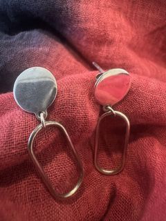 Sterling silver post earrings with oval drop