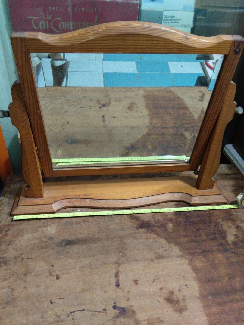 Wooden Shelf Unit - Solid Wood Mirror Display Stand (Category: Other Home Decor) located in Singapore. Submitted by mypassionlisbon (Listing ID 1453053342, Image 1). Description: - Solid wood Mirror shelf unit - Natural wood grain finish - Sturdy construction - Versatile: display items or use as a small stand - Shows minor signs of wear - Approx. 20 inches tall - Ready for a new home Can stand or hang on wall..