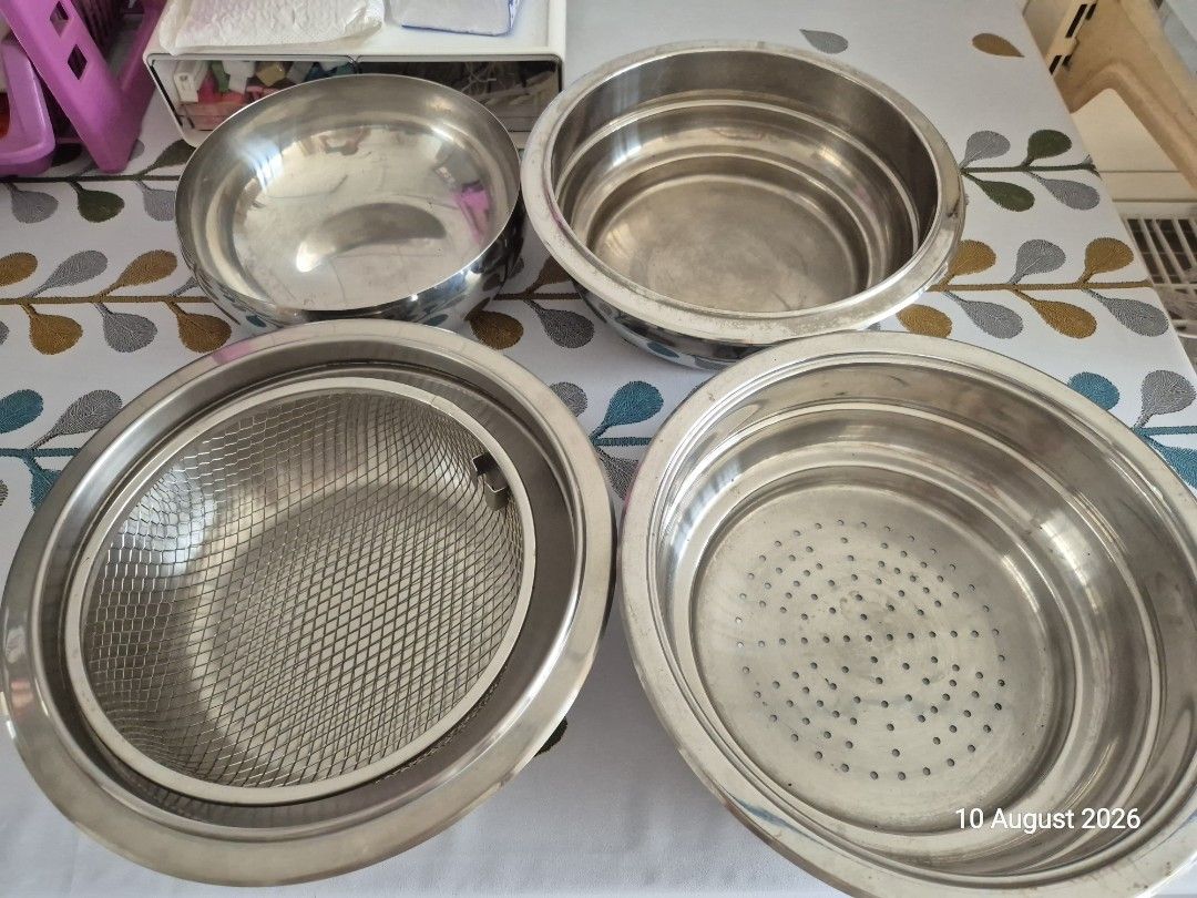 Stainless Steel Kitchenware Accessories - Bowls, Strainer, Fry Basket etc (Category: Cookware & Accessories) located in Singapore. Submitted by worldoutthere82 (Listing ID 1454798003, Image 1). Description: - Set of stainless steel kitchenware accessories - Compatible with AMC and FMK cookware set - Ideal for food preparation and cooking - Could sell individually ($5) or as a set ($20) - Ready for your kitchen after some scrubbing. - Self collect
