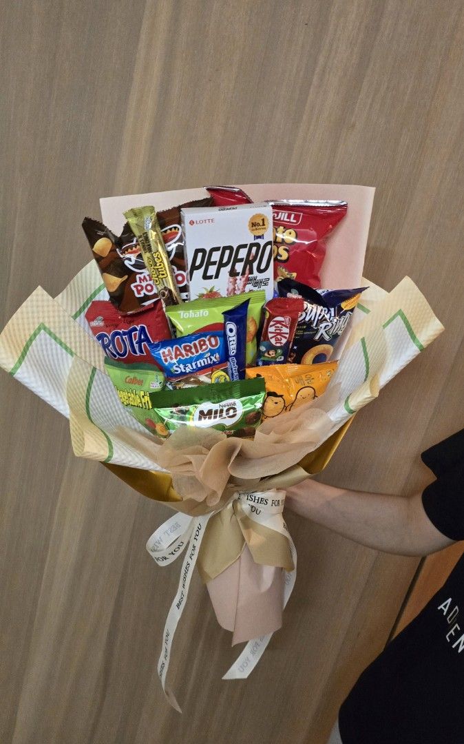SNACKS BOUQUETS (Category: Flowers & Bouquets) located in Singapore. Submitted by pk.blossom (Listing ID 1455556875, Image 2). Description: ours snacks bouquets from $18 and above can be used use for any occasions you desires. just DM us for more details.