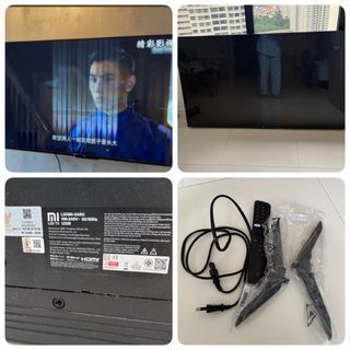 Spoilt TV Xiaomi 50inch complete with remote and stand
