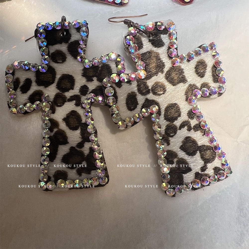 y2k/gyaru bedazzled cheetah print cross earrings (Category: Earrings) located in Singapore. Submitted by y2kqueen (Listing ID 1455734509, Image 2). Description: PREORDER colours: brown, white, pink.
