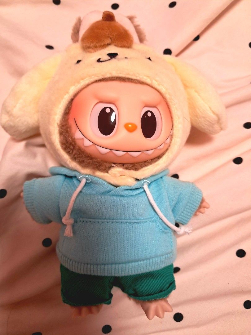 Authentic Official Labubu Plush Keychain PomPom Purin Sanrio Series (Category: Plushies & Soft Toys) located in Singapore. Submitted by chigirini (Listing ID 1455983017, Image 1). Description: Authentic Official Labubu Plush Keychain PomPom Purin Sanrio Series (comes w card!) In perfect condition : $45! ♡.