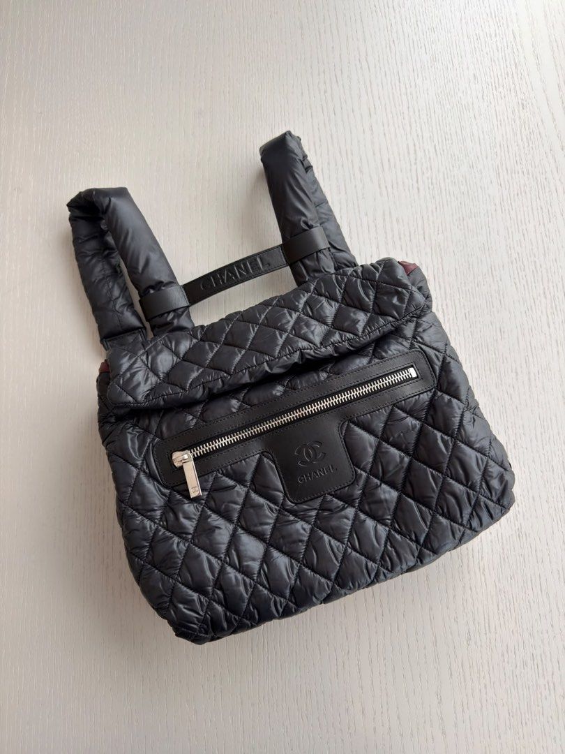 Chanel Coco Cocoon Backpack / Shoulder Bag Nylon Black Silver hardware (Category: Bags & Wallets) located in Singapore. Submitted by yasfinds (Listing ID 1456101015, Image 2). Description: Chanel Coco Cocoon Backpack / Shoulder Bag Excellent condition L36 H27 D10cm Nylon Black Silver hardware Series 13 (year 2009-2010) Comes with bag only F1408 Whats App: Kai @ +65 98263475.