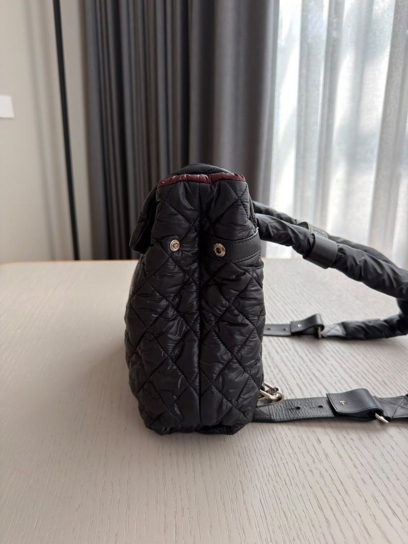Chanel Coco Cocoon Backpack / Shoulder Bag Nylon Black Silver hardware (Category: Bags & Wallets) located in Singapore. Submitted by yasfinds (Listing ID 1456101015, Image 12). Description: Chanel Coco Cocoon Backpack / Shoulder Bag Excellent condition L36 H27 D10cm Nylon Black Silver hardware Series 13 (year 2009-2010) Comes with bag only F1408 Whats App: Kai @ +65 98263475.