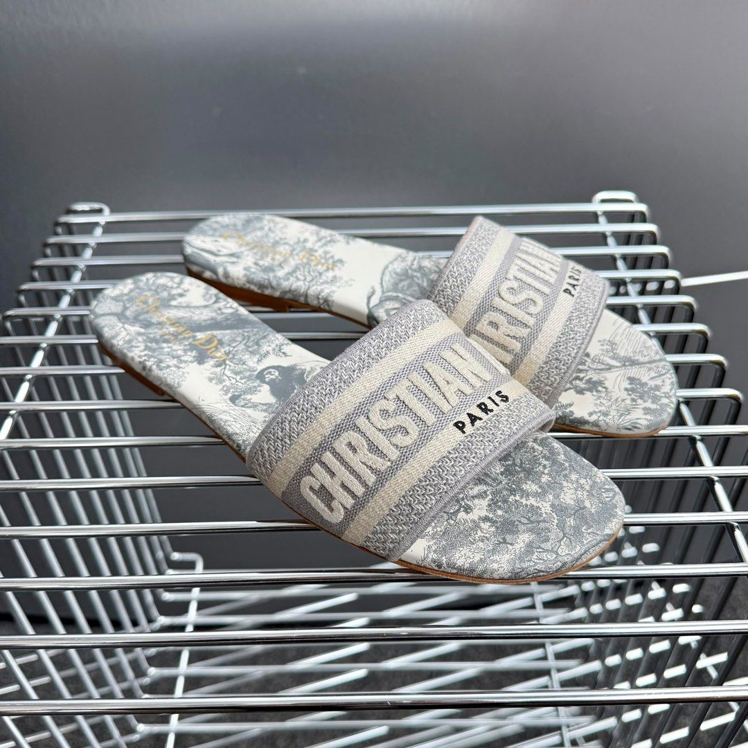 Dior Toile de Jouy Embroidered Cotton Dway Slides Grey Size 38 (Category: Sneakers & Footwear) located in Singapore. Submitted by yasfinds (Listing ID 1456103359, Image 3). Description: Dior Toile de Jouy Embroidered Cotton Dway Slides Kept unworn 9.9/10 Grey Size 38 Comes with full set, receipt dated 2026 F1508 Whats app +65 98263475.