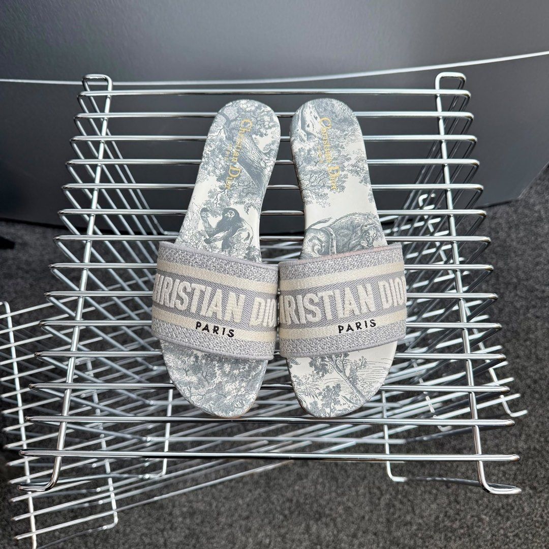 Dior Toile de Jouy Embroidered Cotton Dway Slides Grey Size 38 (Category: Sneakers & Footwear) located in Singapore. Submitted by yasfinds (Listing ID 1456103359, Image 2). Description: Dior Toile de Jouy Embroidered Cotton Dway Slides Kept unworn 9.9/10 Grey Size 38 Comes with full set, receipt dated 2026 F1508 Whats app +65 98263475.