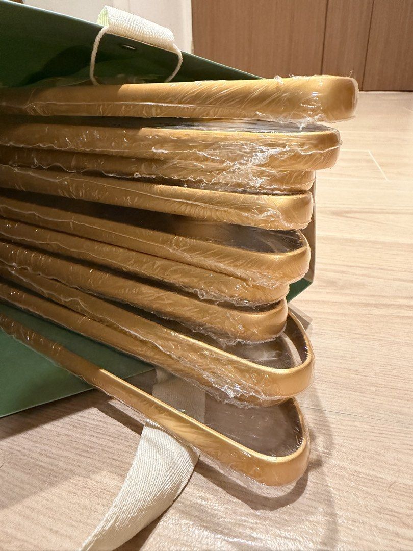 BN Gold Metal Hangers (Set of 10) (Category: Hooks & Hangers) located in Singapore. Submitted by sunevenings (Listing ID 1456352063, Image 2). Description: - Set of 10 BN gold metal hangers - Individually wrapped in plastic - Strong and durable construction - Ideal for CAPSULE wardrobes, or just to organise suits, dresses, and cardigans etc.