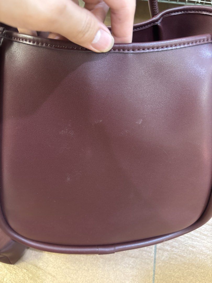 (GOOD BUY) Charles and Keith Lyla Tubular Slouchy Tote Bag - Mulberry Plum (Category: Tote Bags) located in Singapore. Submitted by christinaloo9 (Listing ID 1456281116, Image 3). Description: - Selling about less than half of retail - NO cracks NO peeling of leather - No packaging included Product information: https://www.charleskeith.com/sg/CK2-30781483_ML.PLM.html?ampv=gallery-no-video-treatment.