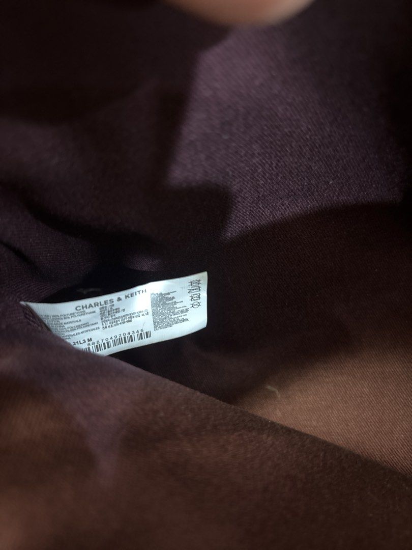 (GOOD BUY) Charles and Keith Lyla Tubular Slouchy Tote Bag - Mulberry Plum (Category: Tote Bags) located in Singapore. Submitted by christinaloo9 (Listing ID 1456281116, Image 4). Description: - Selling about less than half of retail - NO cracks NO peeling of leather - No packaging included Product information: https://www.charleskeith.com/sg/CK2-30781483_ML.PLM.html?ampv=gallery-no-video-treatment.