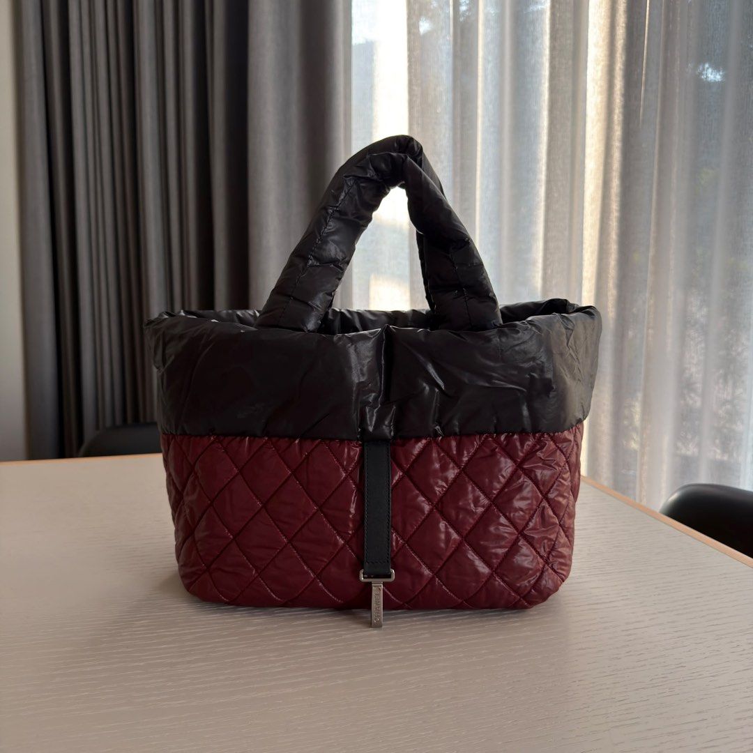 Chanel Coco Cocoon Tote Small Nylon Black Silver hardware (Category: Bags & Wallets) located in Singapore. Submitted by yasfinds (Listing ID 1456457110, Image 15). Description: Chanel Coco Cocoon Tote Excellent condition Small L44 H26 D14cm Handle drop 12cm Nylon Black Silver hardware Series 13 (year 2009-2010) Comes with Dust bag only F1508 Whats App: Kai @ +65 98263475.
