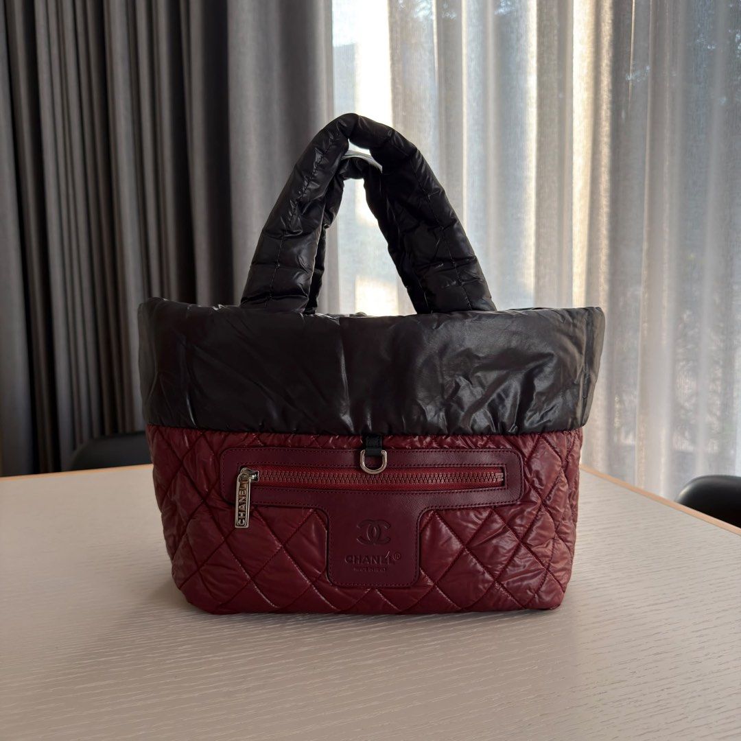 Chanel Coco Cocoon Tote Small Nylon Black Silver hardware (Category: Bags & Wallets) located in Singapore. Submitted by yasfinds (Listing ID 1456457110, Image 14). Description: Chanel Coco Cocoon Tote Excellent condition Small L44 H26 D14cm Handle drop 12cm Nylon Black Silver hardware Series 13 (year 2009-2010) Comes with Dust bag only F1508 Whats App: Kai @ +65 98263475.