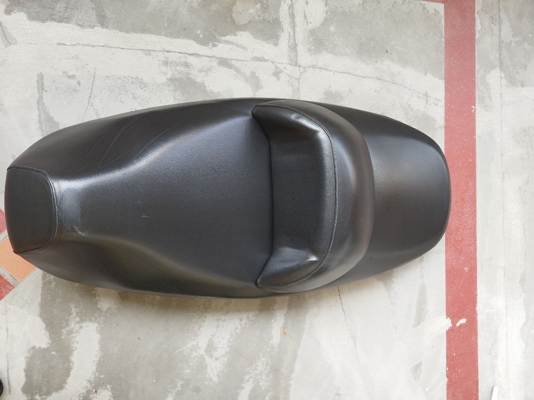 SYM SEAT for GTS 125, GTS 250, JOYMAX (Category: Motorcycle Accessories) located in Singapore. Submitted by sure_sell (Listing ID 1456449863, Image 1). Description: -Featutes brand new upholstery -part number: 77200-HMA-0000 -Direct replacement for your scooter.