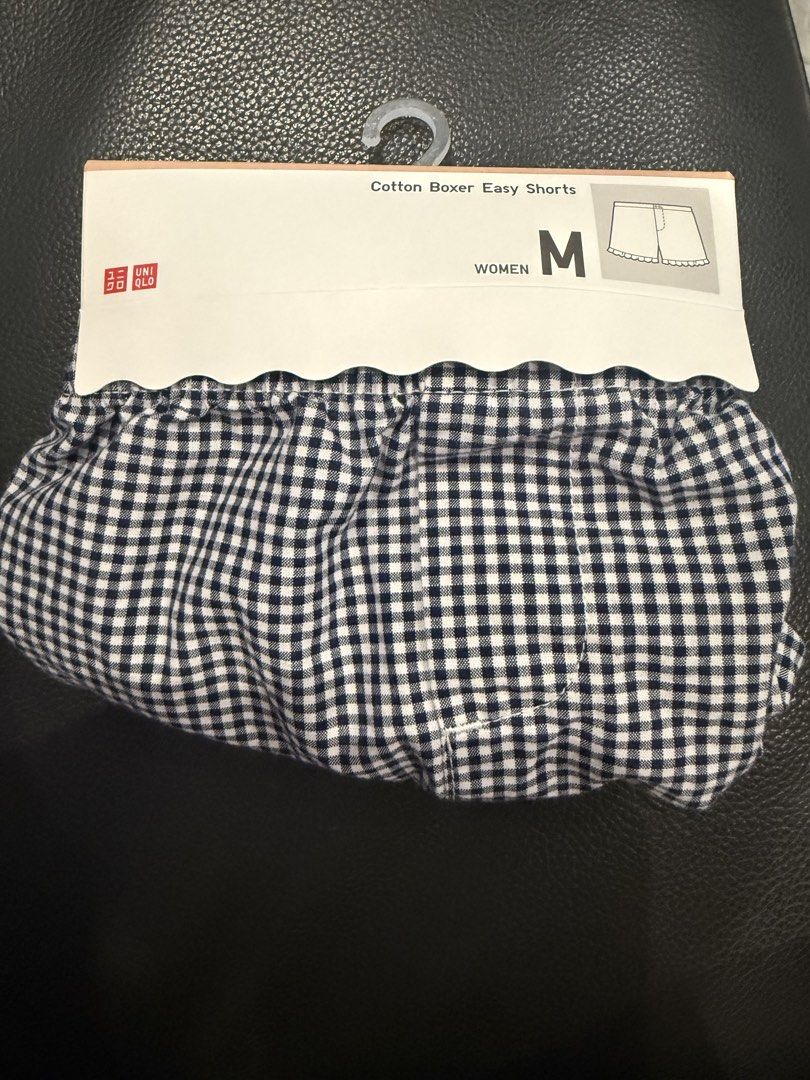 BNWT UNIQLO Cotton Boxer Easy Shorts (Category: Shorts) located in Singapore. Submitted by stilettos13 (Listing ID 1453378826, Image 3). Description: - Material: Comfy Cotton - Design: Classic Navy Gingham Pattern - Features: Elastic waistband, button fly - Ideal for: Lounging or sleeping - Size: Medium (M) scroll to last photo for measurements .