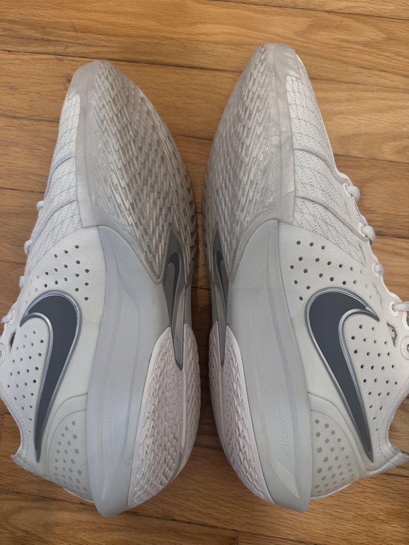 Nike Air Zoom GT Cut 3 Silver White US9.5 (Category: Racket & Ball Sports) located in Singapore. Submitted by hepdhxks (Listing ID 1453341941, Image 4). Description: 9/10 condition 100% Authentic Lightly worn No box No sole separation Cushioning and traction in excellent condition Clean and well maintained Meetup preferred Slightly negotiable for serious buyers.