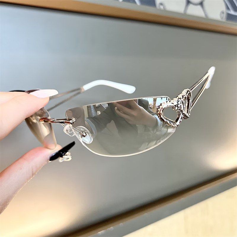 y2k sunnies sunglasses (Category: Sunglasses & Eyewear) located in Singapore. Submitted by y2kqueen (Listing ID 1453374983, Image 3). Description: PREORDER colours: black, silver, orange, purple, pink, brown.