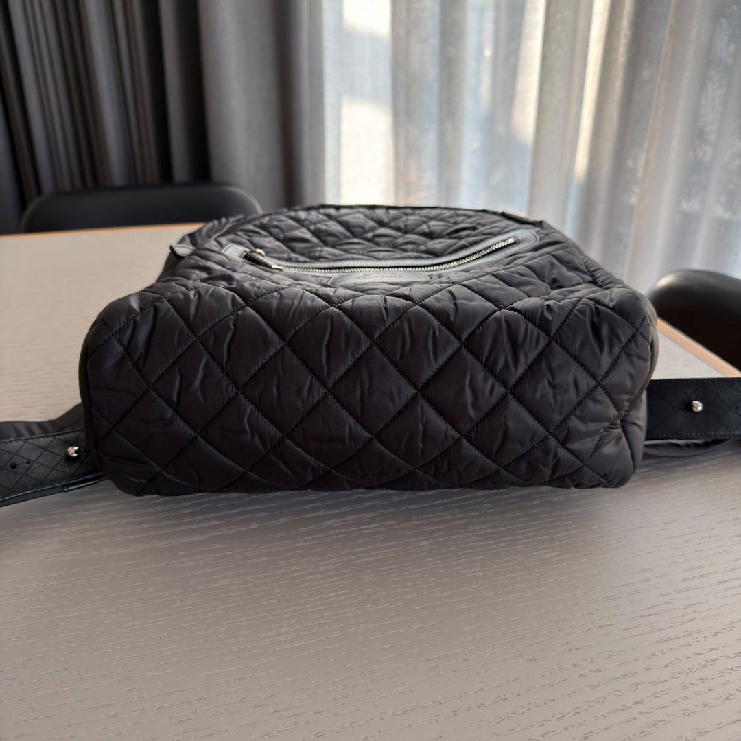 Chanel Coco Cocoon Backpack Small Quilted nylon Black Silver hardware (Category: Bags & Wallets) located in Singapore. Submitted by yasfinds (Listing ID 1456460908, Image 5). Description: Chanel Coco Cocoon Backpack Excellent condition Small L28 H35 D11cm Quilted nylon Black Silver hardware Series 20 (year 2014-2015) Comes with dust bag only F1708 Whats App: Kai @ +65 98263475.