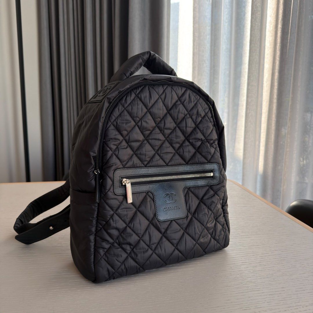 Chanel Coco Cocoon Backpack Small Quilted nylon Black Silver hardware (Category: Bags & Wallets) located in Singapore. Submitted by yasfinds (Listing ID 1456460908, Image 1). Description: Chanel Coco Cocoon Backpack Excellent condition Small L28 H35 D11cm Quilted nylon Black Silver hardware Series 20 (year 2014-2015) Comes with dust bag only F1708 Whats App: Kai @ +65 98263475.